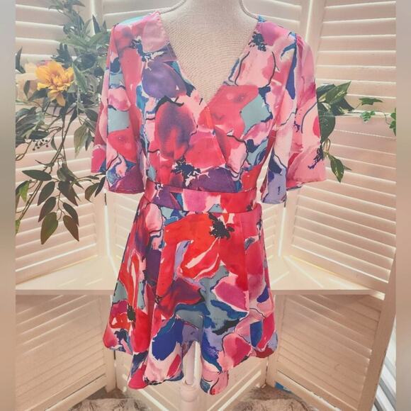 92 Umgee Floral Print Short Bell Sleeve V-Neck Romper with a Waist Tie - Picture 2 of 6